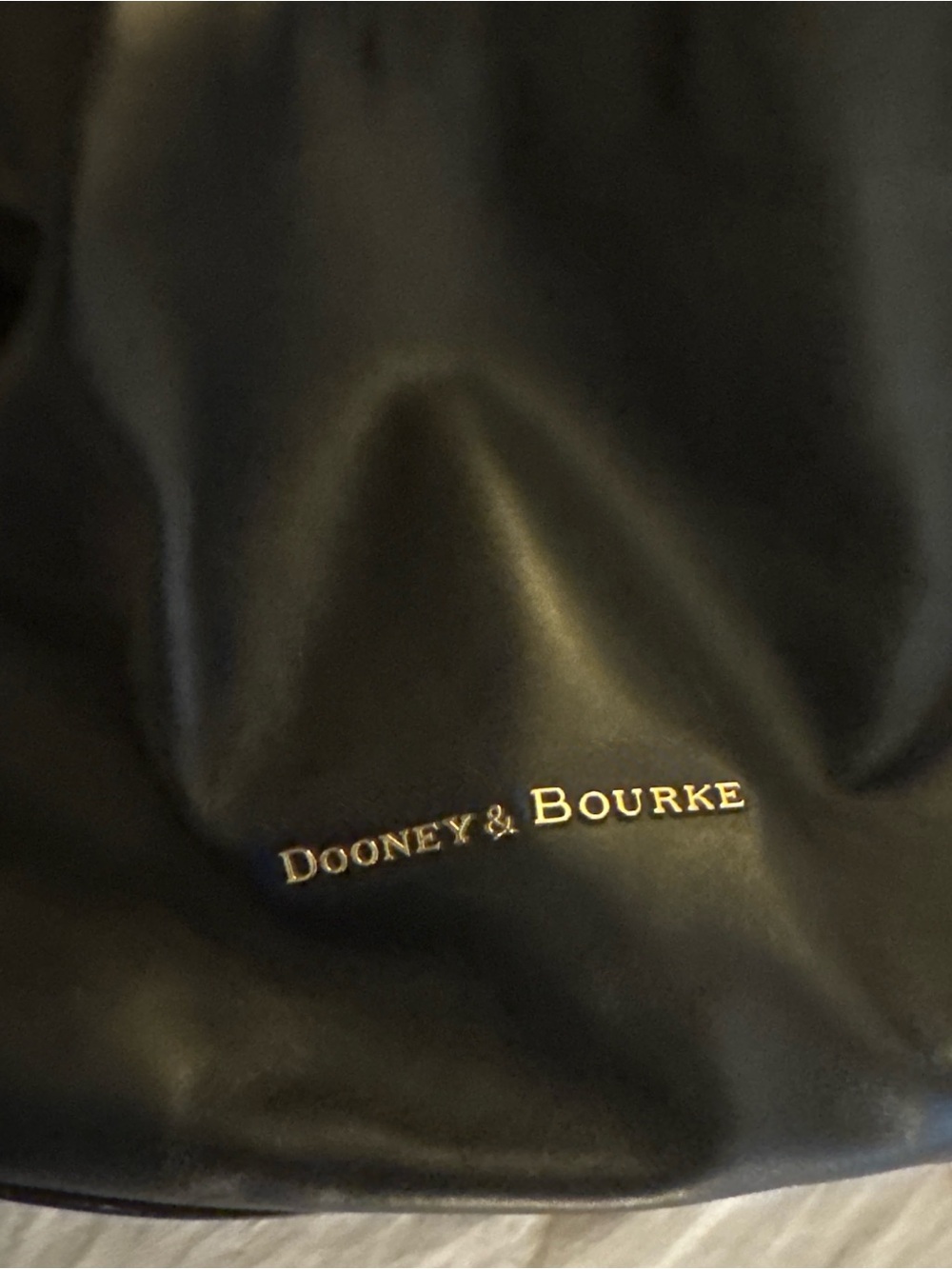 Dooney & Bourke Black Handbag with Gold Logo